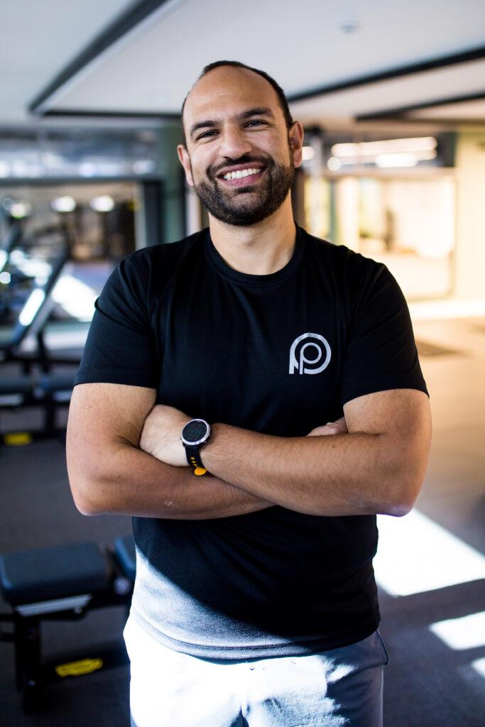 Coach Arj Thiruchelvam inside a gym